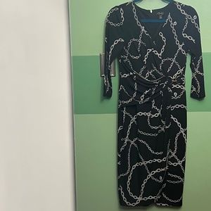 Thalia Sodi black dress with silver/white chain link print
